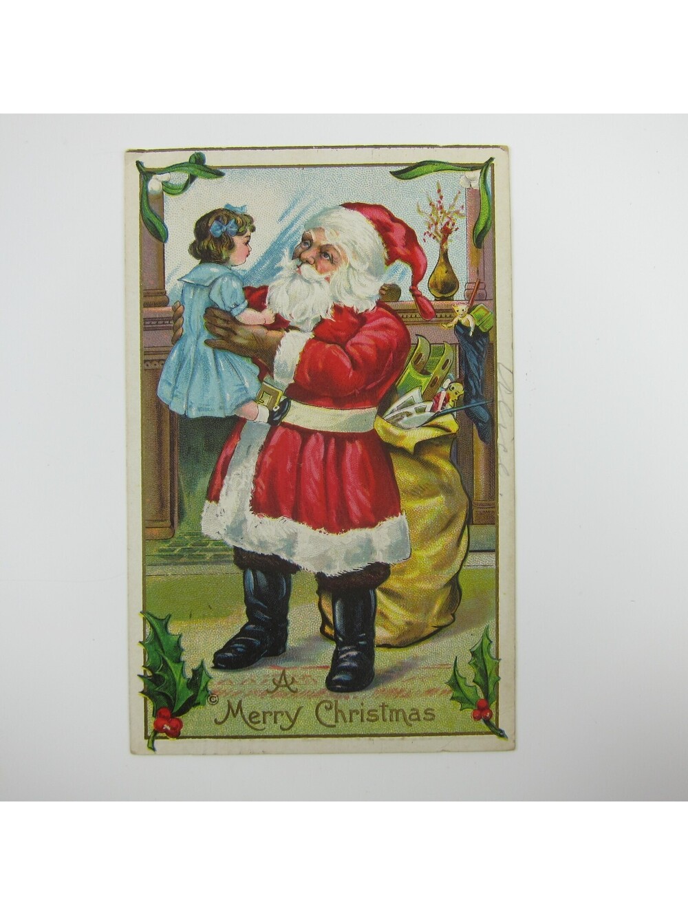 Christmas Postcard Santa Holds Little Girl Bags Toys Gold Embossed Antique 1912